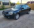 Чорний Кіа Маджентіс, об'ємом двигуна 2 л та пробігом 237 тис. км за 5100 $, фото 1 на Automoto.ua