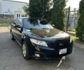 Чорний Кіа Маджентіс, об'ємом двигуна 2 л та пробігом 198 тис. км за 6200 $, фото 1 на Automoto.ua