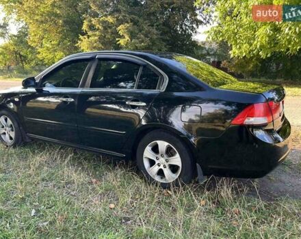 Чорний Кіа Маджентіс, об'ємом двигуна 2 л та пробігом 227 тис. км за 5650 $, фото 2 на Automoto.ua