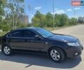 Черный Киа Маджентис, объемом двигателя 2 л и пробегом 185 тыс. км за 6300 $, фото 1 на Automoto.ua