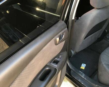 Чорний Кіа Маджентіс, об'ємом двигуна 2 л та пробігом 356 тис. км за 6000 $, фото 14 на Automoto.ua