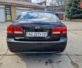Чорний Кіа Маджентіс, об'ємом двигуна 2 л та пробігом 335 тис. км за 6500 $, фото 4 на Automoto.ua