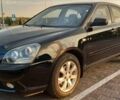 Черный Киа Маджентис, объемом двигателя 2 л и пробегом 215 тыс. км за 5800 $, фото 1 на Automoto.ua