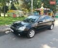 Черный Киа Маджентис, объемом двигателя 2 л и пробегом 367 тыс. км за 6000 $, фото 1 на Automoto.ua
