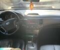 Черный Киа Маджентис, объемом двигателя 2 л и пробегом 190 тыс. км за 5750 $, фото 5 на Automoto.ua