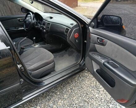 Чорний Кіа Маджентіс, об'ємом двигуна 2 л та пробігом 212 тис. км за 4950 $, фото 12 на Automoto.ua