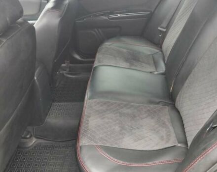 Чорний Кіа Маджентіс, об'ємом двигуна 2 л та пробігом 215 тис. км за 6700 $, фото 5 на Automoto.ua