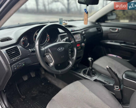 Черный Киа Маджентис, объемом двигателя 2 л и пробегом 229 тыс. км за 5555 $, фото 27 на Automoto.ua