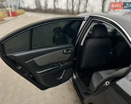 Черный Киа Маджентис, объемом двигателя 2 л и пробегом 229 тыс. км за 5555 $, фото 65 на Automoto.ua