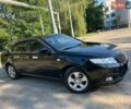 Чорний Кіа Маджентіс, об'ємом двигуна 2 л та пробігом 222 тис. км за 6700 $, фото 1 на Automoto.ua