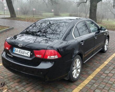 Чорний Кіа Маджентіс, об'ємом двигуна 2 л та пробігом 215 тис. км за 6700 $, фото 1 на Automoto.ua