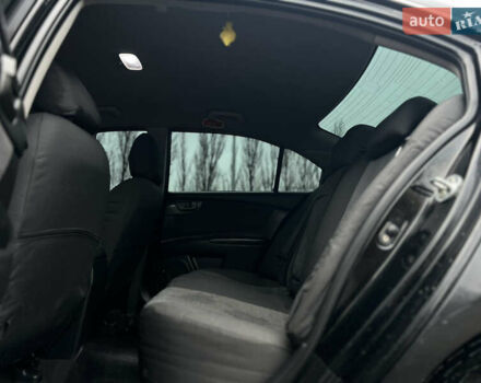 Черный Киа Маджентис, объемом двигателя 2 л и пробегом 229 тыс. км за 5555 $, фото 39 на Automoto.ua