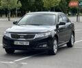 Чорний Кіа Маджентіс, об'ємом двигуна 2 л та пробігом 141 тис. км за 6800 $, фото 1 на Automoto.ua