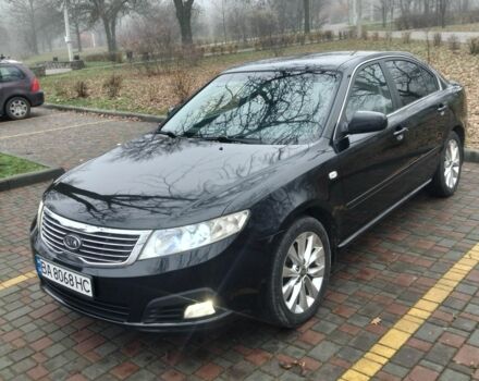 Чорний Кіа Маджентіс, об'ємом двигуна 2 л та пробігом 215 тис. км за 6700 $, фото 4 на Automoto.ua