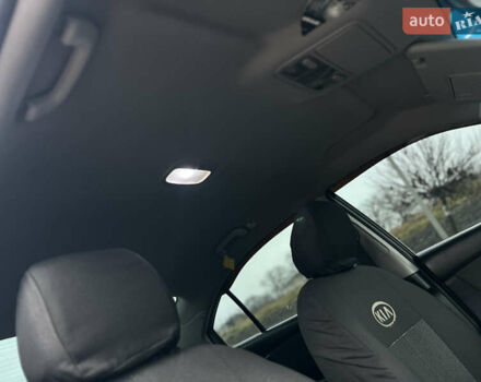 Черный Киа Маджентис, объемом двигателя 2 л и пробегом 229 тыс. км за 5555 $, фото 45 на Automoto.ua