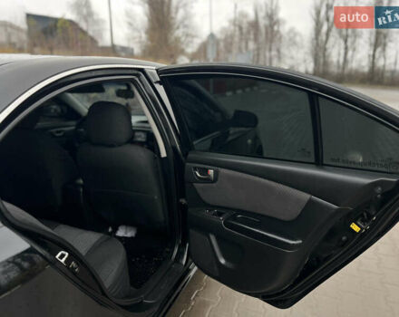 Черный Киа Маджентис, объемом двигателя 2 л и пробегом 229 тыс. км за 5555 $, фото 41 на Automoto.ua