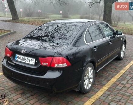Чорний Кіа Маджентіс, об'ємом двигуна 2 л та пробігом 215 тис. км за 6700 $, фото 9 на Automoto.ua