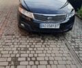 Чорний Кіа Маджентіс, об'ємом двигуна 2 л та пробігом 172 тис. км за 6900 $, фото 1 на Automoto.ua