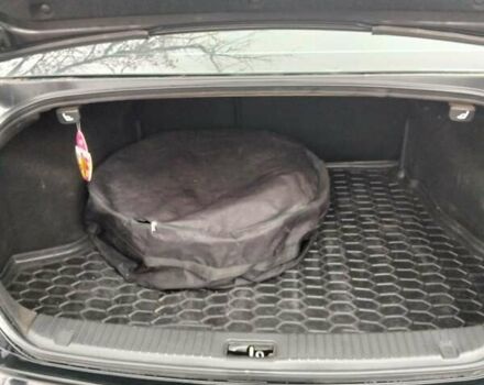 Чорний Кіа Маджентіс, об'ємом двигуна 2 л та пробігом 215 тис. км за 6700 $, фото 6 на Automoto.ua