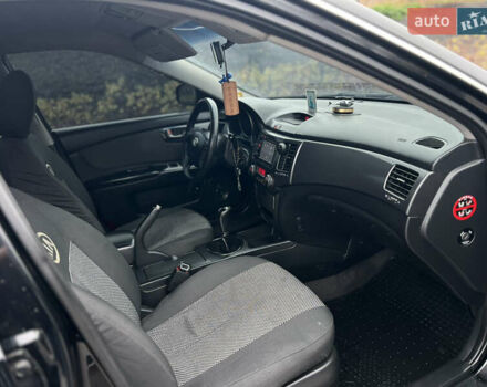 Черный Киа Маджентис, объемом двигателя 2 л и пробегом 229 тыс. км за 5555 $, фото 43 на Automoto.ua