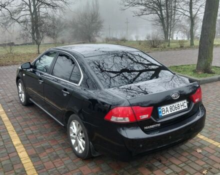 Чорний Кіа Маджентіс, об'ємом двигуна 2 л та пробігом 215 тис. км за 6700 $, фото 2 на Automoto.ua