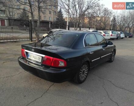 Черный Киа Маджентис, объемом двигателя 2 л и пробегом 136 тыс. км за 1664 $, фото 1 на Automoto.ua