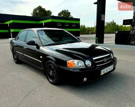 Чорний Кіа Маджентіс, об'ємом двигуна 2 л та пробігом 260 тис. км за 4500 $, фото 1 на Automoto.ua