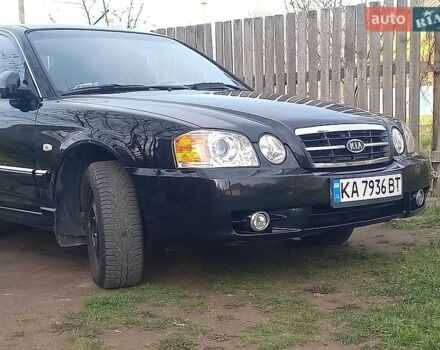 Черный Киа Маджентис, объемом двигателя 2 л и пробегом 273 тыс. км за 3400 $, фото 1 на Automoto.ua