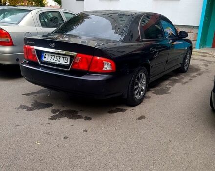 Черный Киа Маджентис, объемом двигателя 2 л и пробегом 200 тыс. км за 3200 $, фото 1 на Automoto.ua