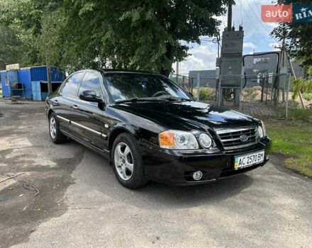 Чорний Кіа Маджентіс, об'ємом двигуна 2 л та пробігом 72 тис. км за 5600 $, фото 1 на Automoto.ua