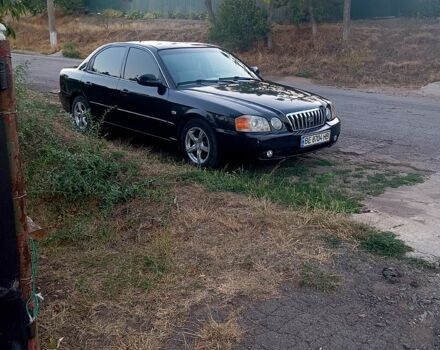 Черный Киа Маджентис, объемом двигателя 2 л и пробегом 268 тыс. км за 3100 $, фото 1 на Automoto.ua