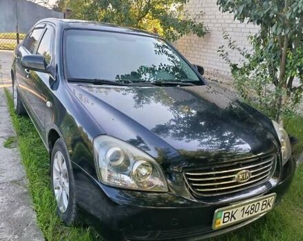 Чорний Кіа Маджентіс, об'ємом двигуна 2 л та пробігом 234 тис. км за 5800 $, фото 1 на Automoto.ua