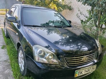 Черный Киа Маджентис, объемом двигателя 2 л и пробегом 240 тыс. км за 4150 $, фото 1 на Automoto.ua