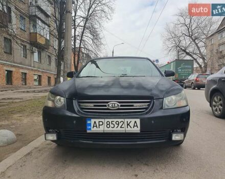 Чорний Кіа Маджентіс, об'ємом двигуна 2 л та пробігом 296 тис. км за 4000 $, фото 1 на Automoto.ua