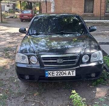 Чорний Кіа Маджентіс, об'ємом двигуна 2 л та пробігом 250 тис. км за 3700 $, фото 1 на Automoto.ua