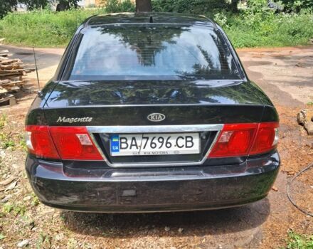 Черный Киа Маджентис, объемом двигателя 2 л и пробегом 275 тыс. км за 3200 $, фото 1 на Automoto.ua