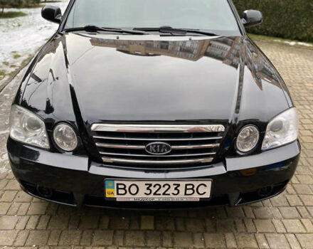 Чорний Кіа Маджентіс, об'ємом двигуна 2 л та пробігом 120 тис. км за 5800 $, фото 1 на Automoto.ua