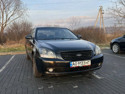 Черный Киа Маджентис, объемом двигателя 2 л и пробегом 355 тыс. км за 5600 $, фото 1 на Automoto.ua