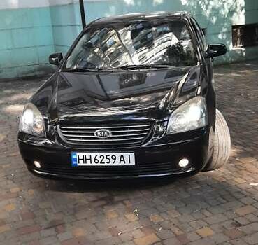 Чорний Кіа Маджентіс, об'ємом двигуна 2 л та пробігом 214 тис. км за 6300 $, фото 1 на Automoto.ua