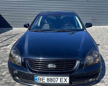 Черный Киа Маджентис, объемом двигателя 2 л и пробегом 350 тыс. км за 5200 $, фото 1 на Automoto.ua