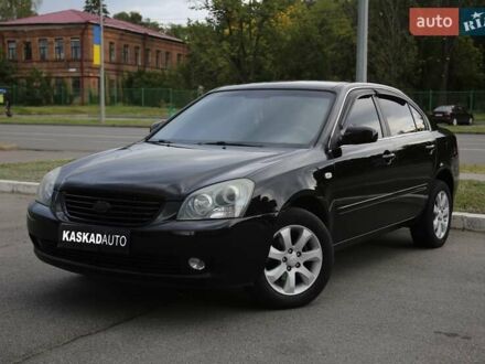 Чорний Кіа Маджентіс, об'ємом двигуна 2 л та пробігом 296 тис. км за 5950 $, фото 1 на Automoto.ua