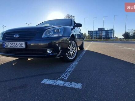 Чорний Кіа Маджентіс, об'ємом двигуна 2 л та пробігом 373 тис. км за 4500 $, фото 1 на Automoto.ua