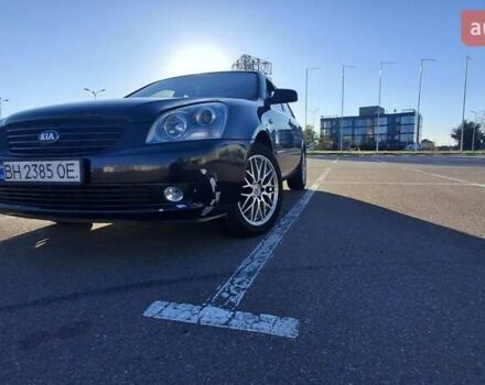 Чорний Кіа Маджентіс, об'ємом двигуна 2 л та пробігом 373 тис. км за 4500 $, фото 1 на Automoto.ua
