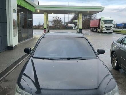 Чорний Кіа Маджентіс, об'ємом двигуна 2.7 л та пробігом 230 тис. км за 6500 $, фото 1 на Automoto.ua