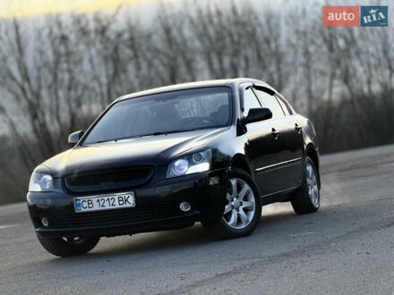 Чорний Кіа Маджентіс, об'ємом двигуна 2 л та пробігом 305 тис. км за 5400 $, фото 1 на Automoto.ua