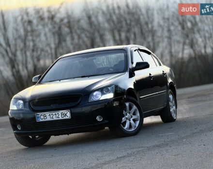 Чорний Кіа Маджентіс, об'ємом двигуна 2 л та пробігом 305 тис. км за 5400 $, фото 1 на Automoto.ua