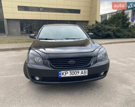 Черный Киа Маджентис, объемом двигателя 2 л и пробегом 299 тыс. км за 5200 $, фото 1 на Automoto.ua