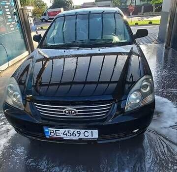 Чорний Кіа Маджентіс, об'ємом двигуна 2 л та пробігом 180 тис. км за 4700 $, фото 1 на Automoto.ua