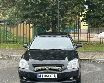 Черный Киа Маджентис, объемом двигателя 2 л и пробегом 335 тыс. км за 3500 $, фото 1 на Automoto.ua