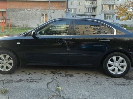 Черный Киа Маджентис, объемом двигателя 2 л и пробегом 309 тыс. км за 5500 $, фото 1 на Automoto.ua